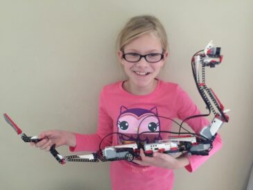 girl with robotics kit